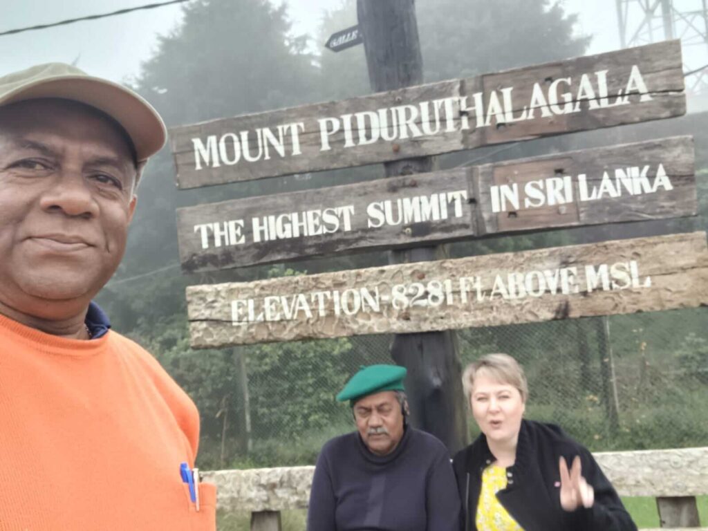 BR Travels Ambayaluwo tour guests exploring Mount Pidurutalagala